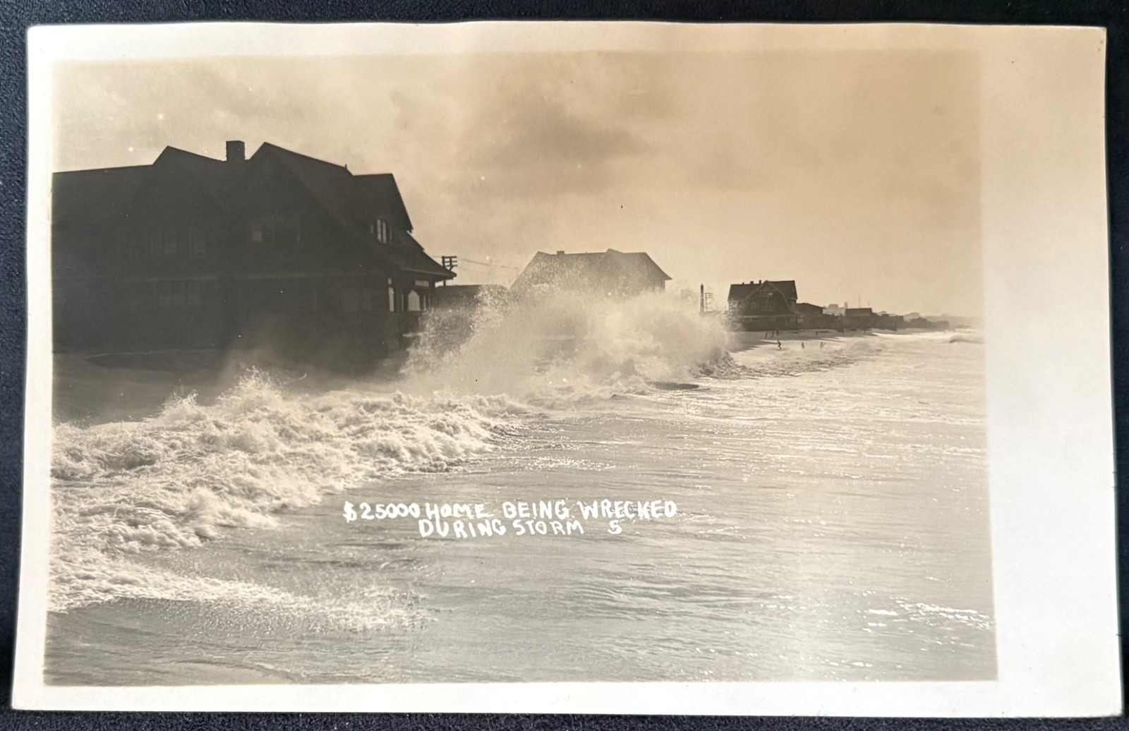REAL PHOTO DISASTER $25000 HOME BEING WRECKED DURING STORM RPPC POSTCARD
