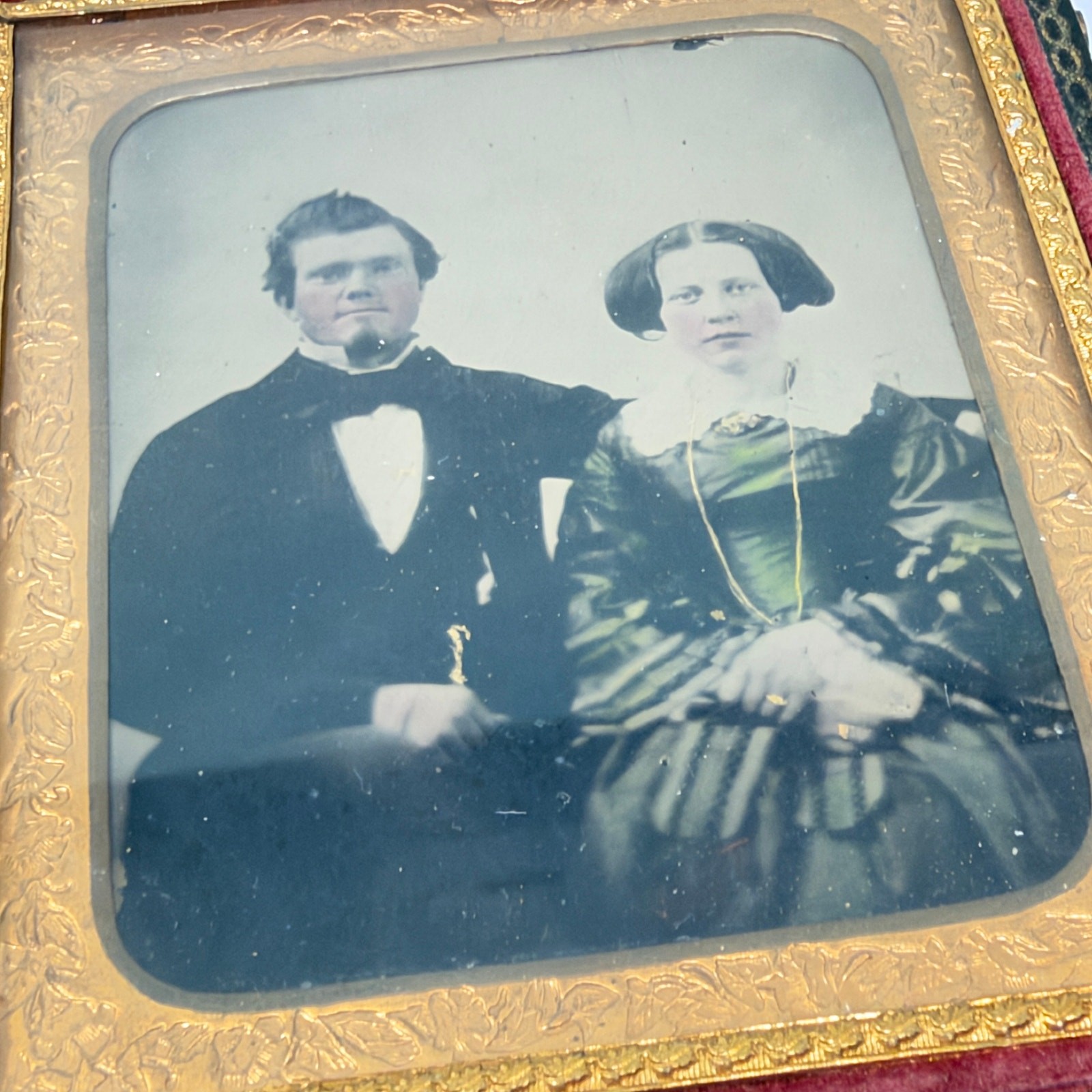 1/6th Plate Ambrotype Seated Couple Tinted Union Case