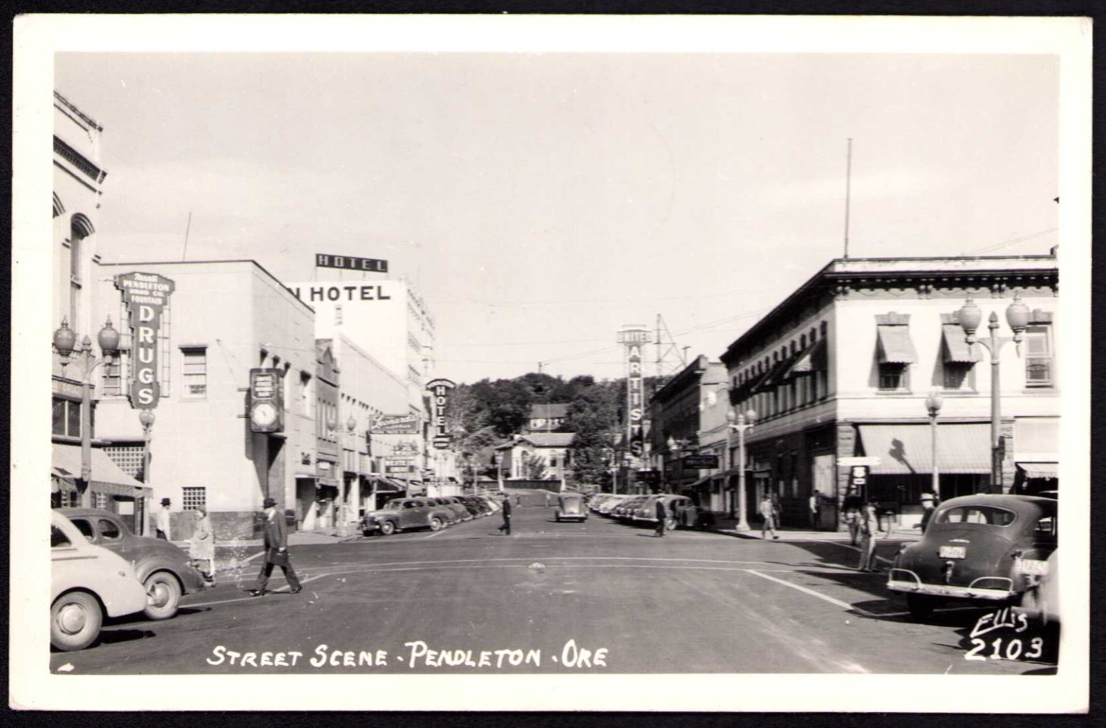 Postcard RPPC Oregon OR Pendleton 1947 Downtown Drug Store Movie Theatre Cars