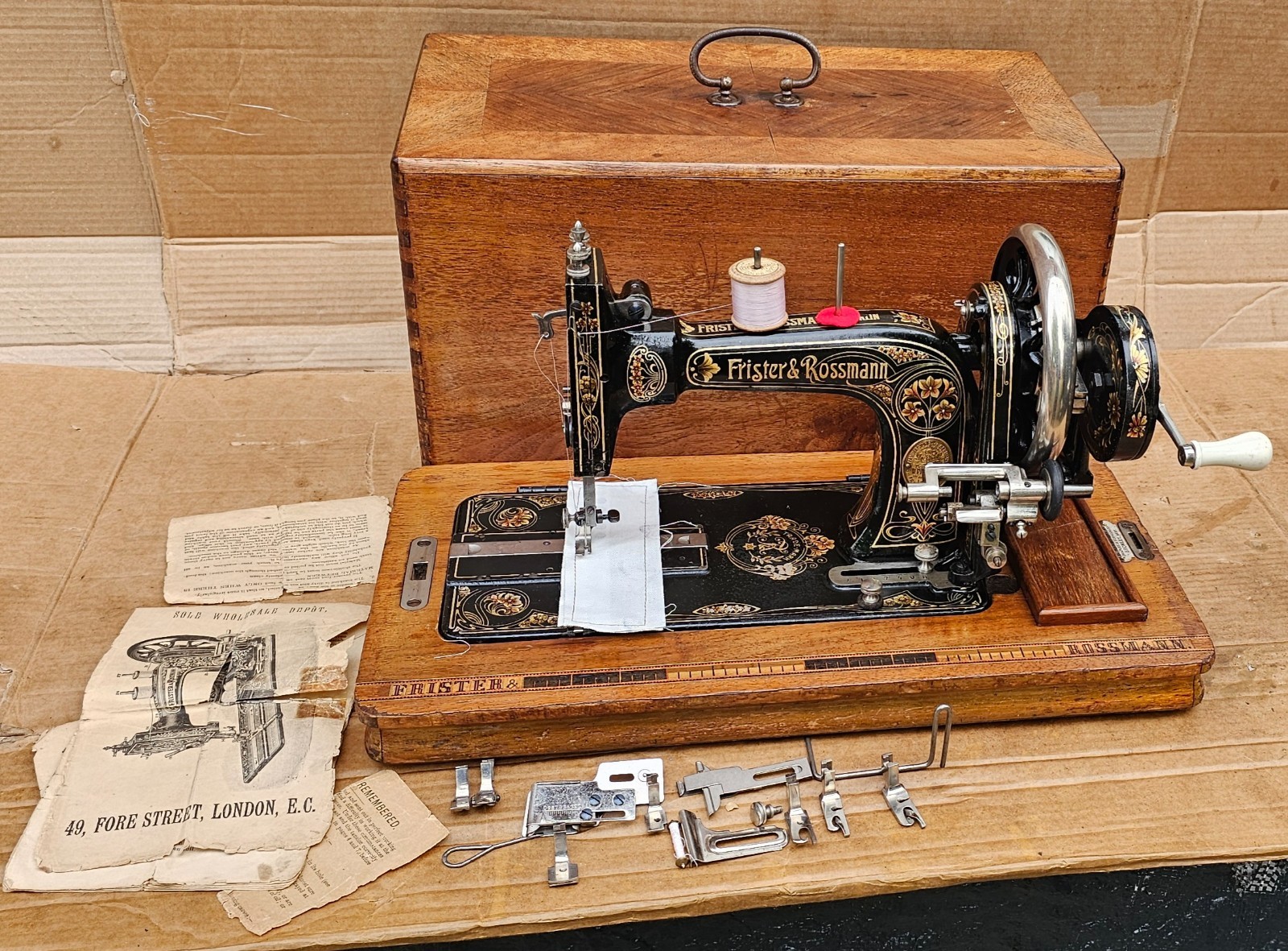 Frister Rossmann Hand crank Sewing machine with Instruction manual.