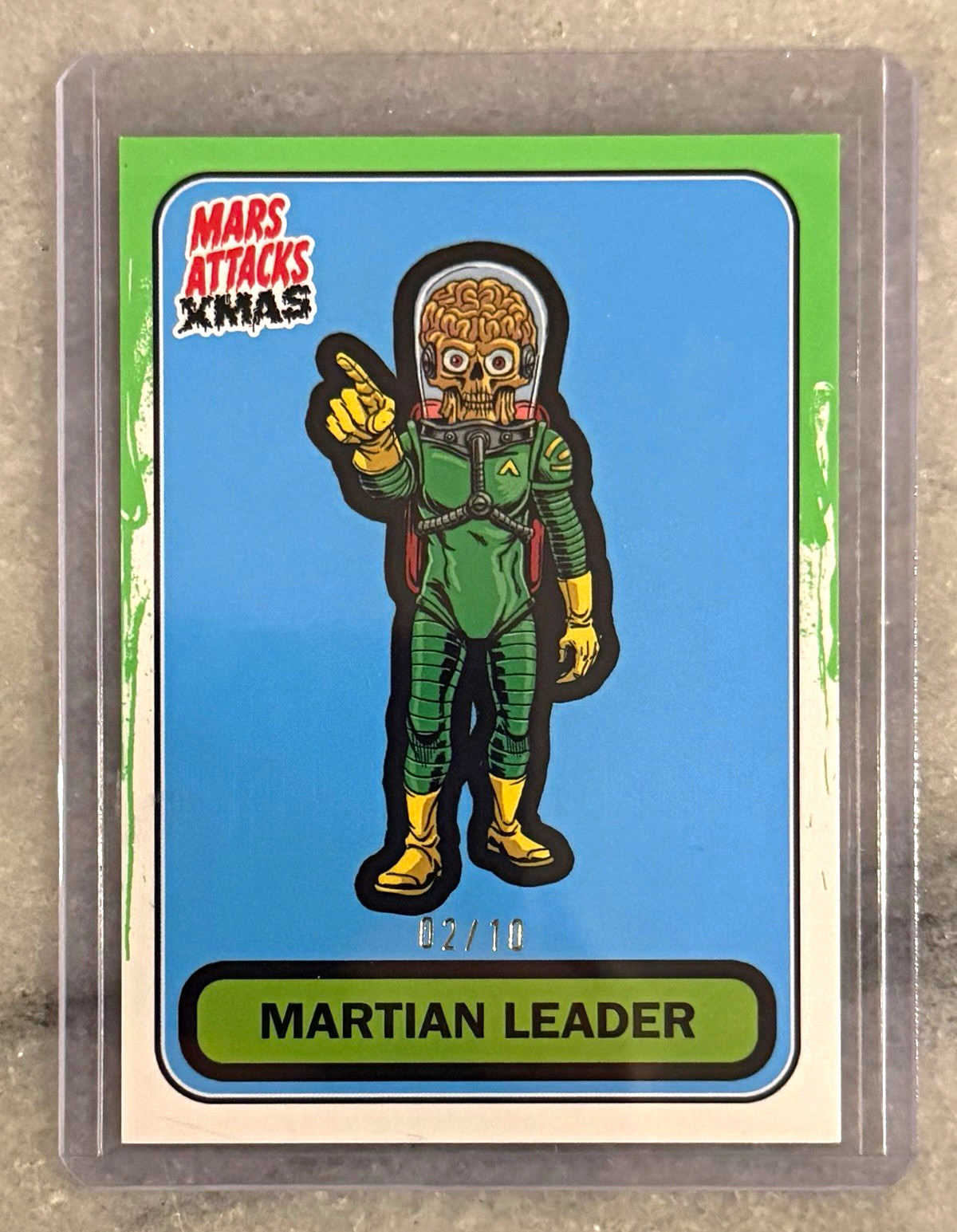 2026 Topps Mars Attacks Xmas Martian Leader Green /10 B-57 SSP