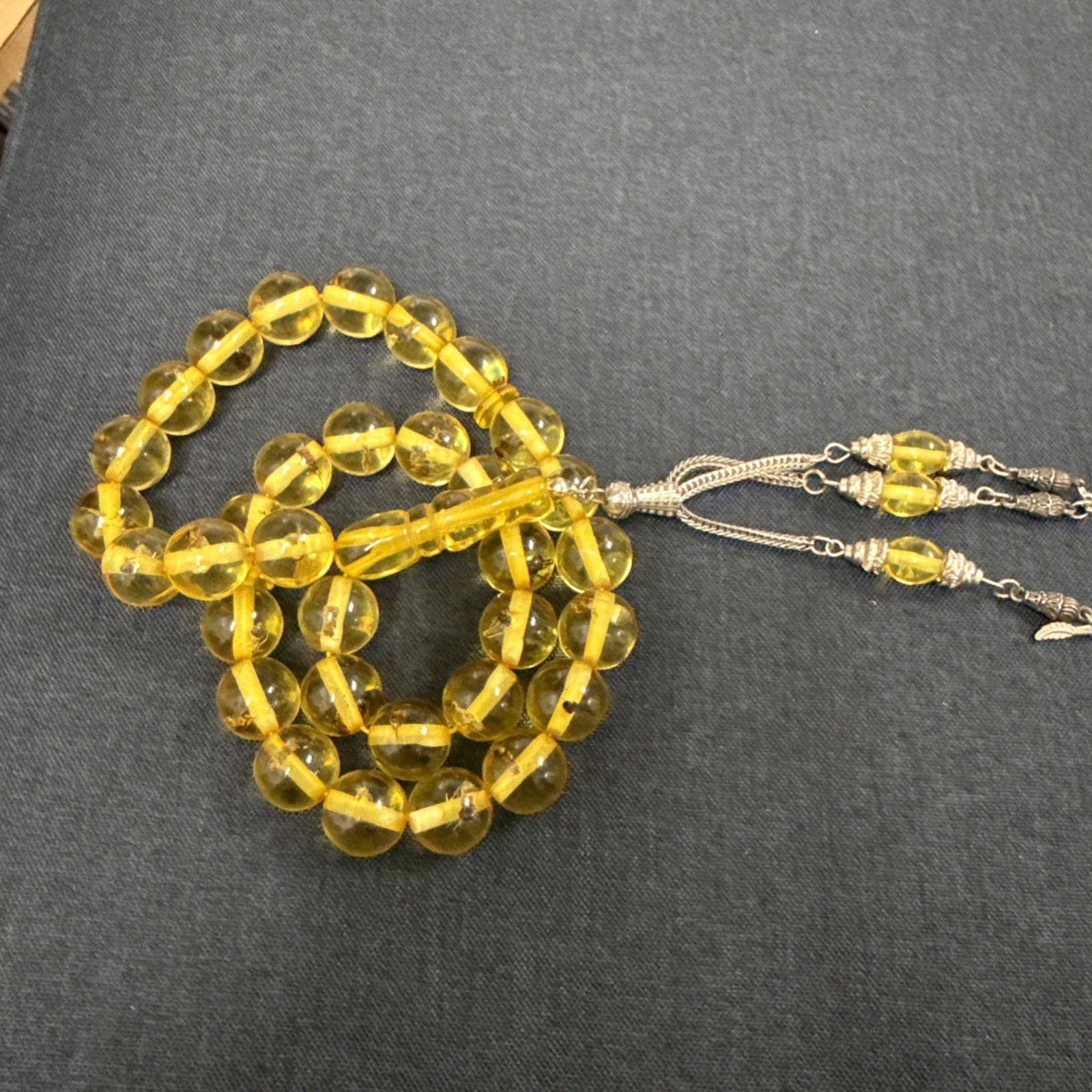 Rare amber-style misbaha Islamic prayer beads with insect inclusions collectible