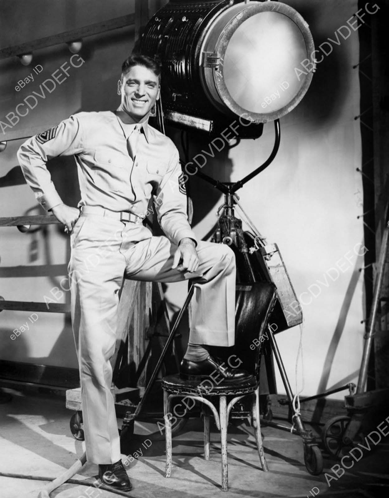 | Burt Lancaster behind the scenes with the movie equipment - dp-05550