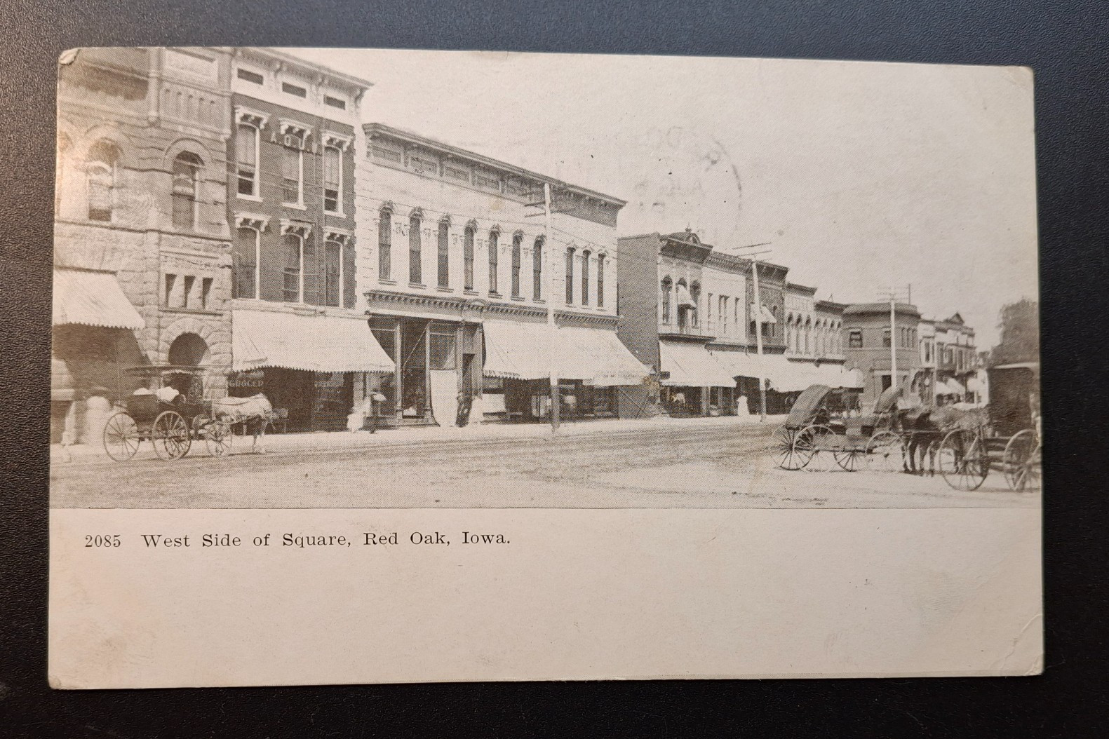 Red Oak Iowa Postcard West Side of Square Shops Wagons 1907