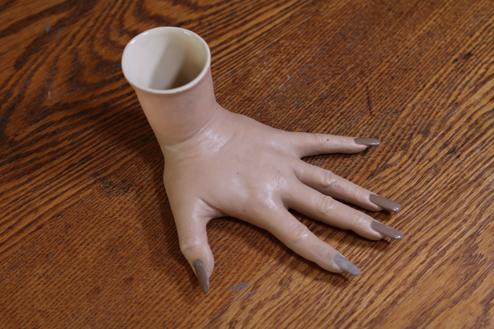 Creepy lifesize ceramic severed hand