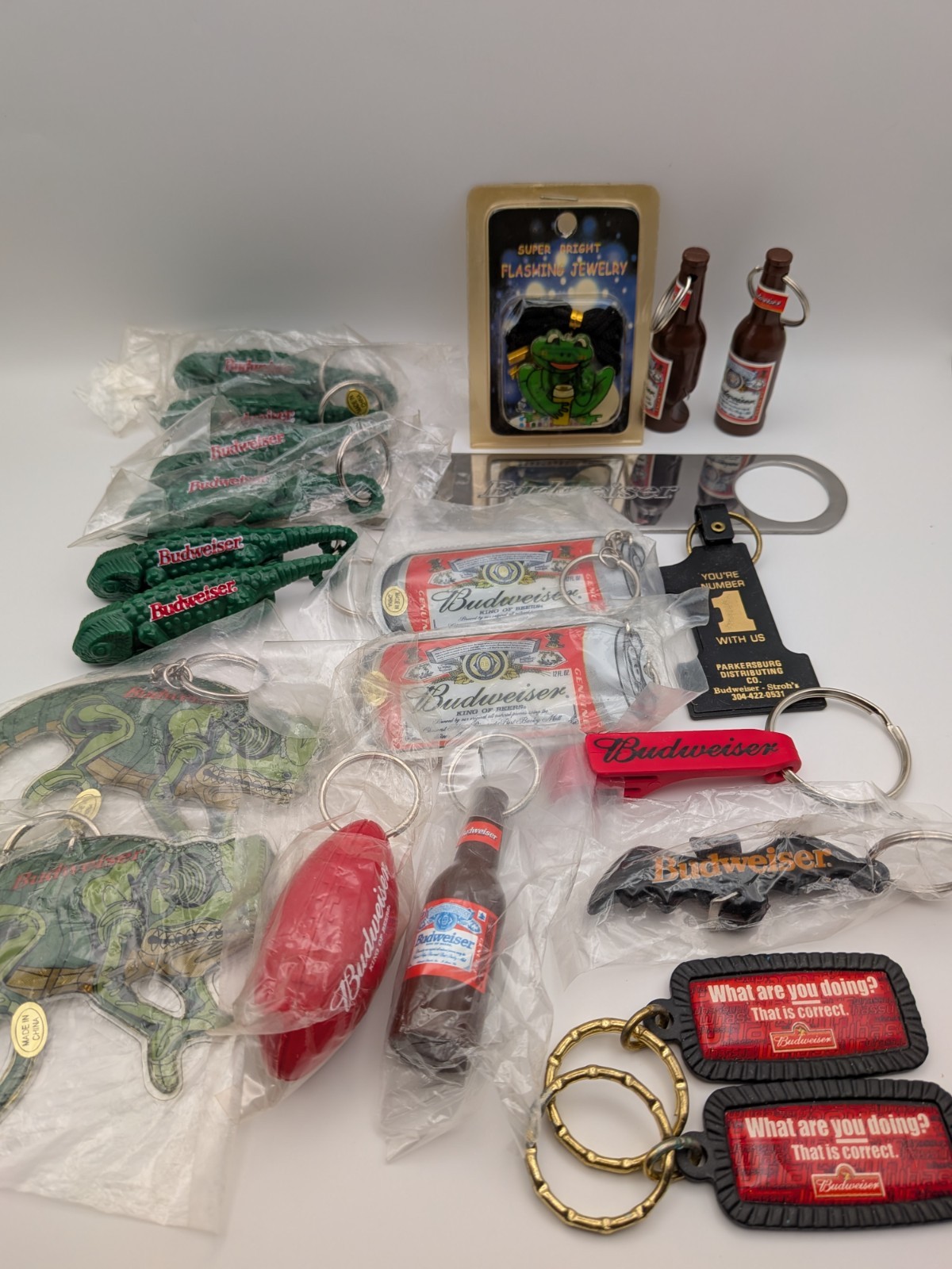 Vintage Budweiser Memorabilia Lot Keychains Bottle Openers Flashing Pins