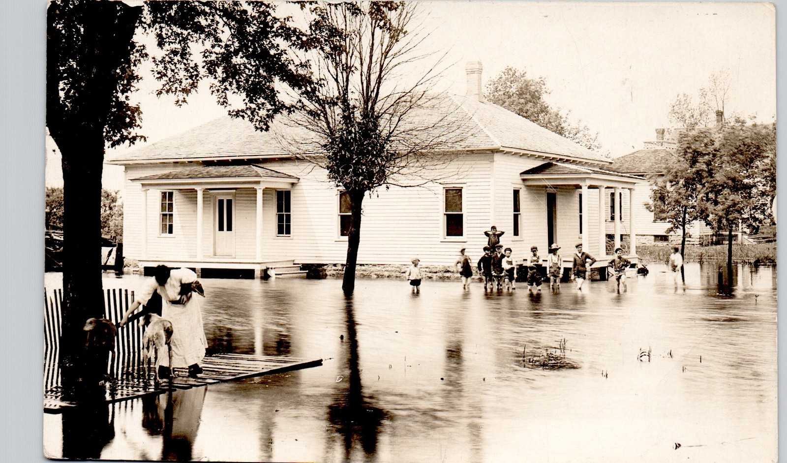 KIDS PLAYING IN FLOOD waseca mn c1910 postcard minnesota real photo rppc street