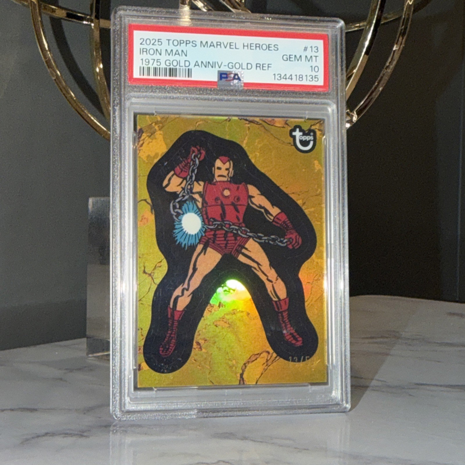 Topps 2025 Marvel Heroes Iron Man #13 1975 Gold Anniv Gold Refractor PSA 10 /50