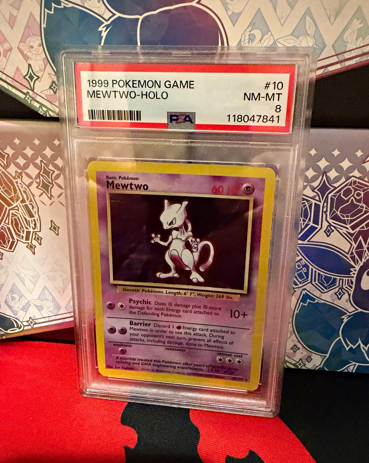 Pokémon 1999 Game Mewtwo Holo Card #10 PSA 8 Cert 118047841