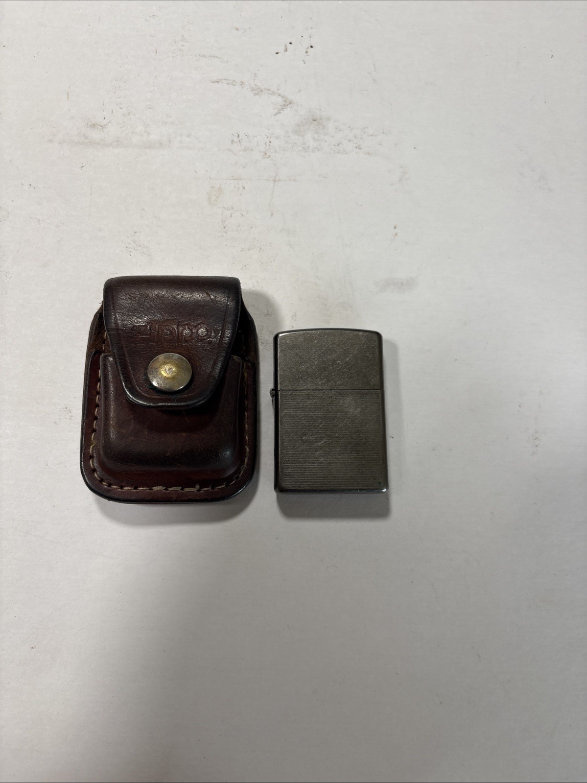 Zippo Lighter April 2006 Has Seal with Leather Pouch  Holder Case Belt Loop