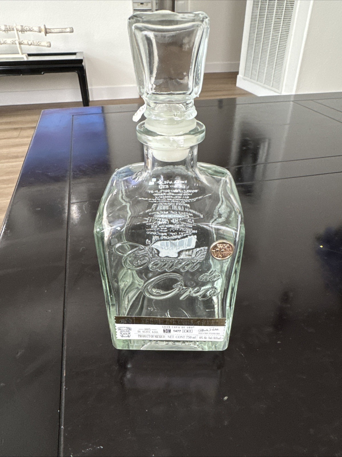 Cava de Oro Extra Anejo Tequila Bottle, 750ml, Open, empty bottle 