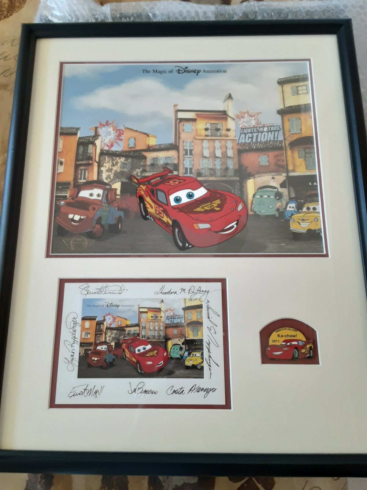 Signed Disney Cel Ka-Chow With Photo And Pin. With certificate of authenticity