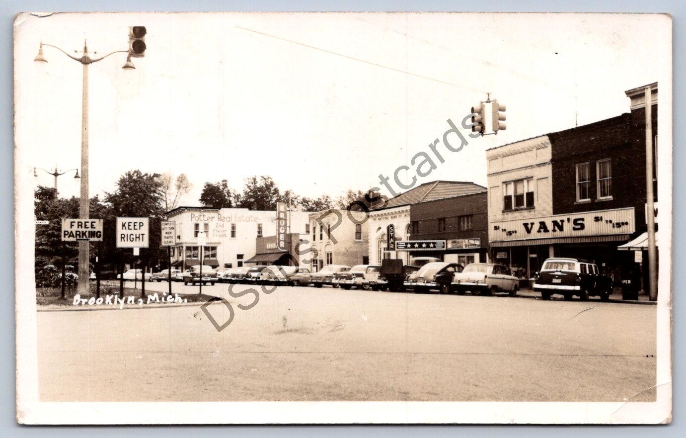 JH23/ Brooklyn Michigan RPPC Postcard c1950s Main Street Van\'s Store 144