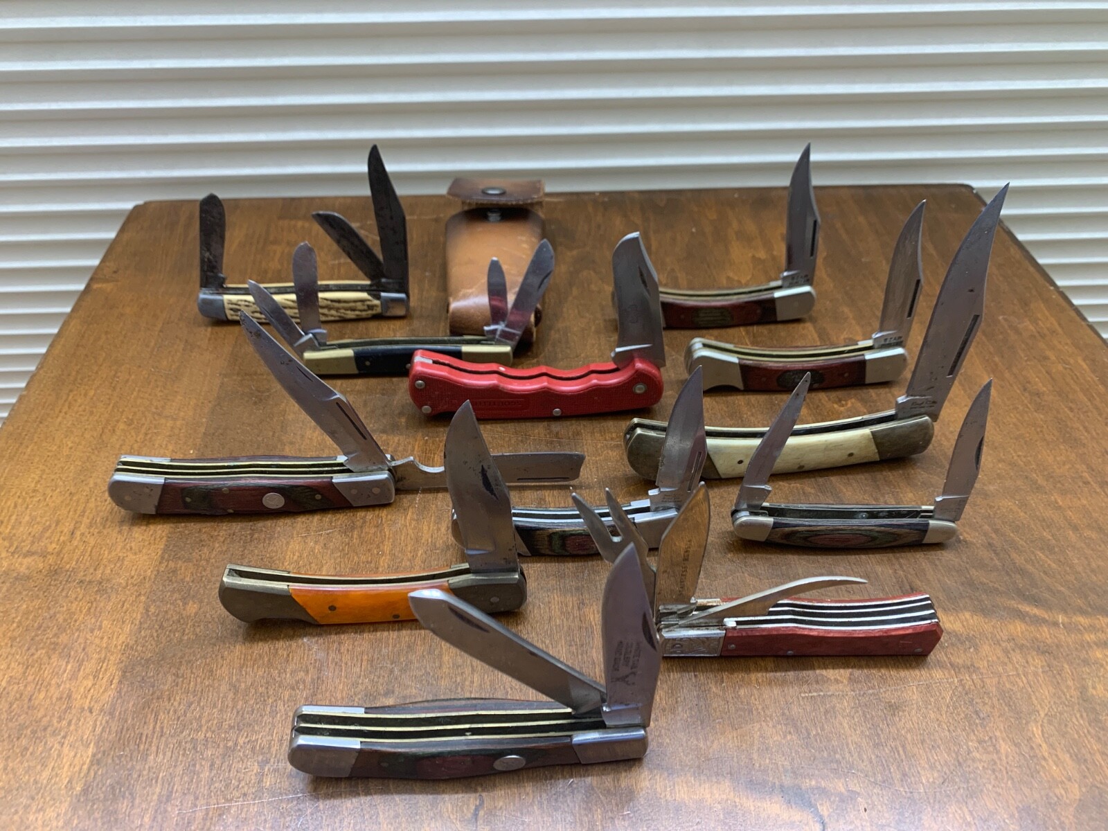 12 Used Pocket Knives, 