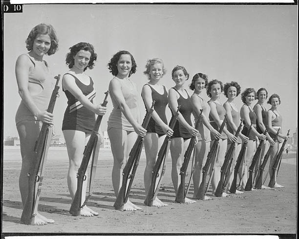 Rifle Team Posing on Beach with Rifles 1933 Photo Combining Beauty, Grace and