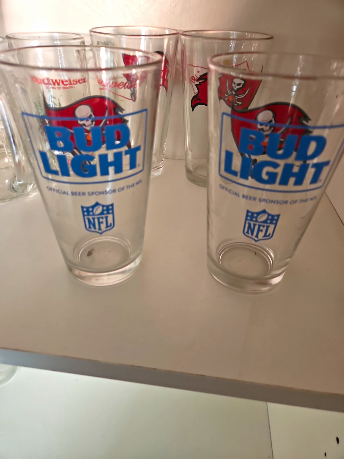 10 bud/bud light cups n 7 authentic Budweiser steins 