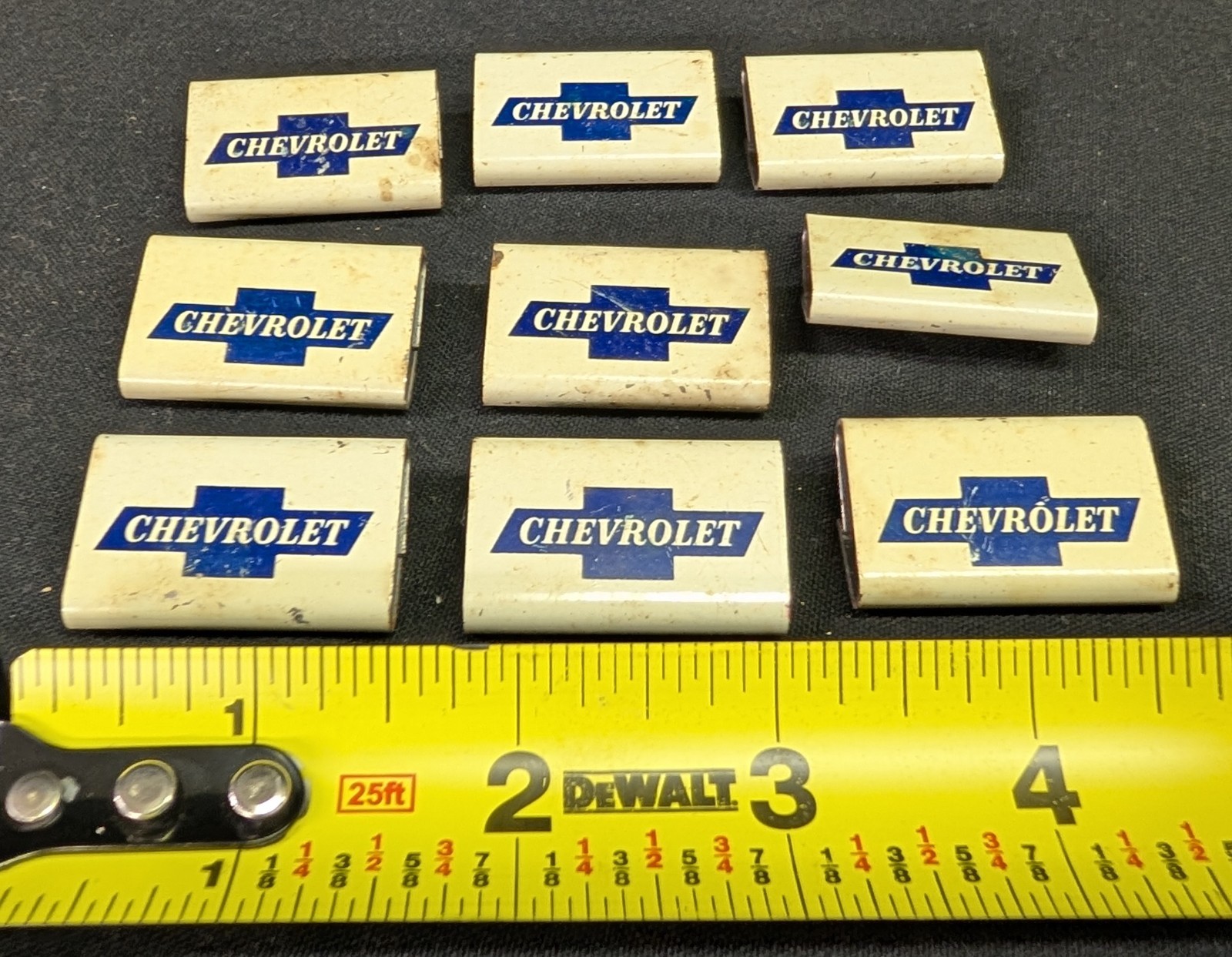 Lot of 9 Chevrolet Bowtie sign metal clip binders from Chevrolet Plant