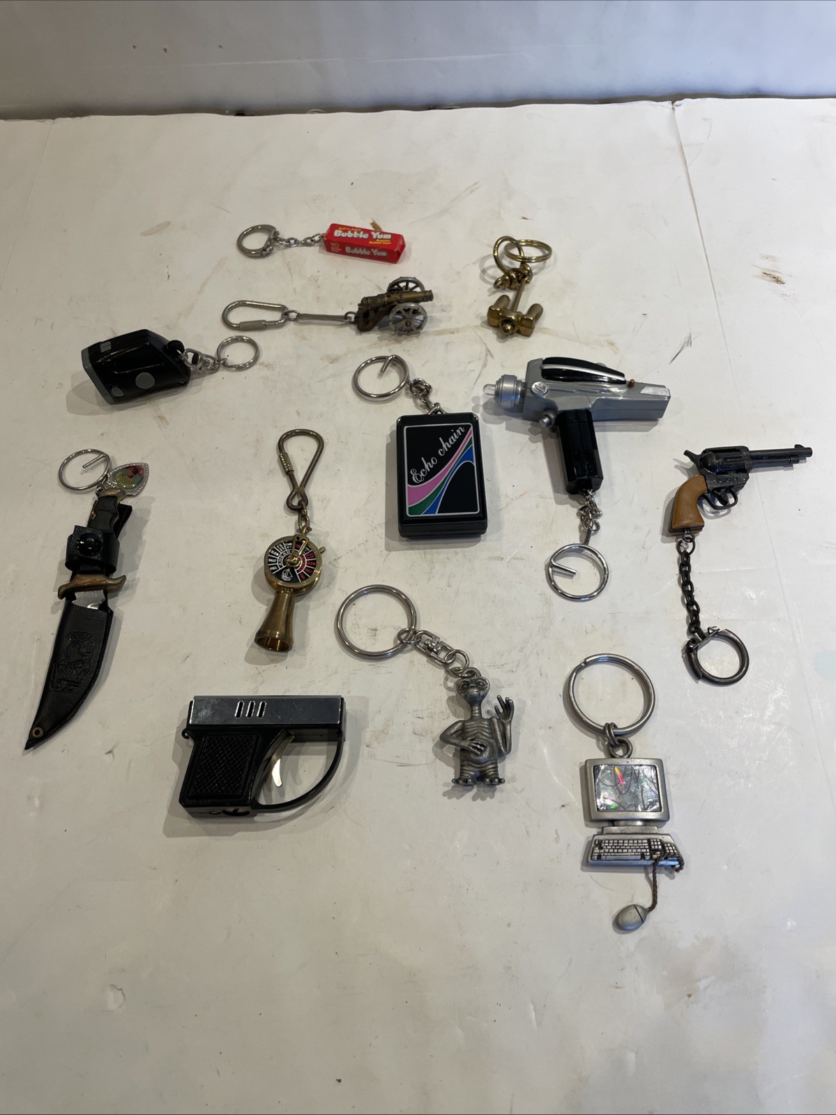 Lot Of (12) Rare Vintage Keychains ET, Bubble Yum, Echo, Phaser,revolver,cannon Lot Of (12) Rare Vintage Keychains ET, Bubble Yum, Echo, Phaser,revolver,cannon