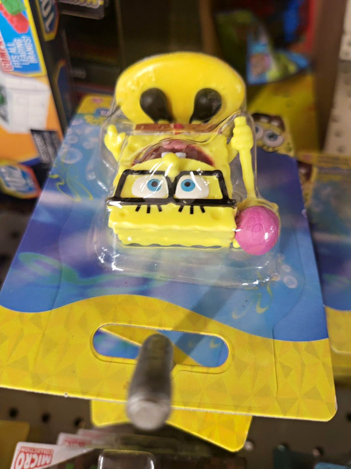 Nickelodeon SpongeBob SquarePants Micro Figure w/ Glasses & Pink Lollipop Boxed