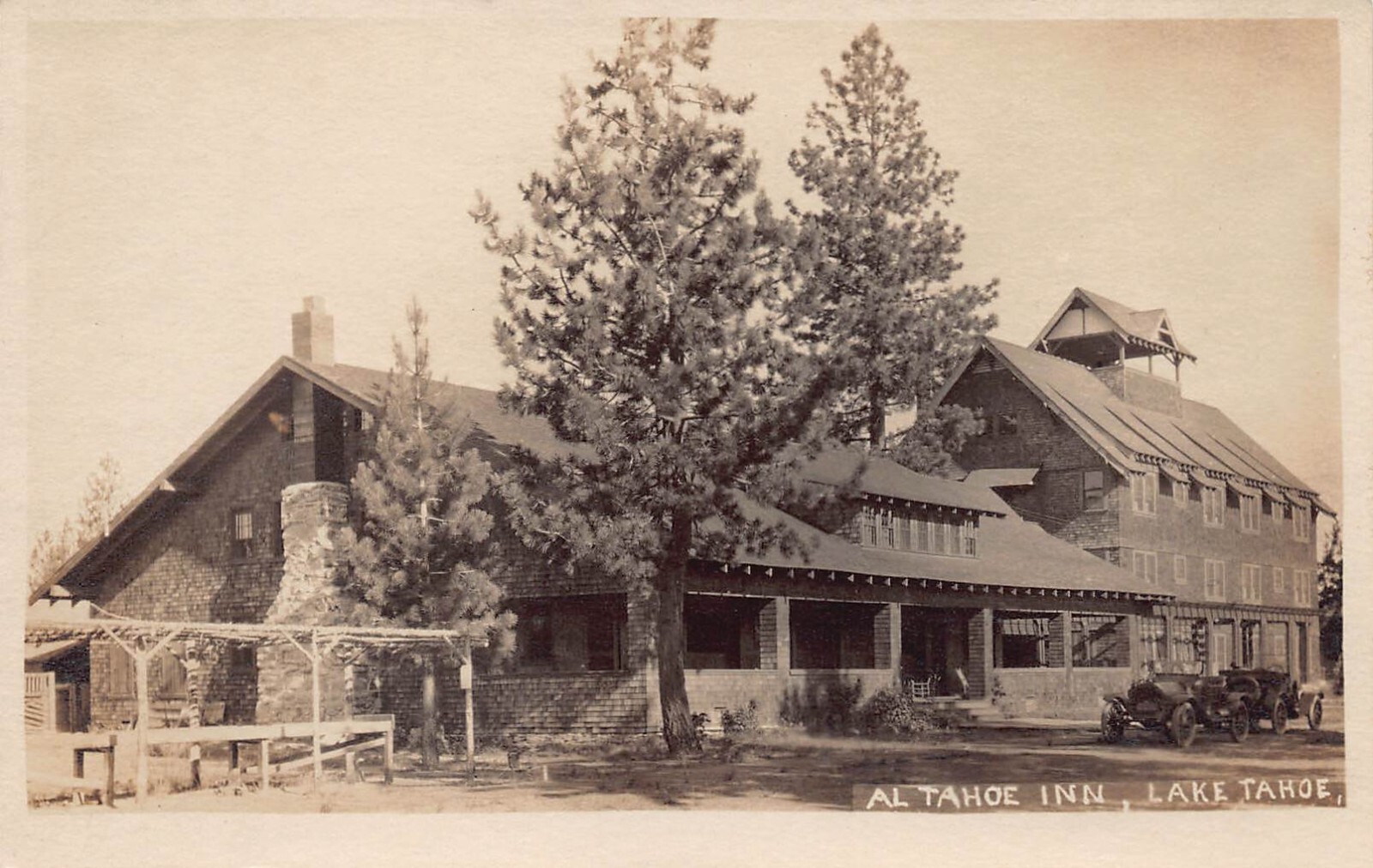 RPPC Lake Al Tahoe CA Inn Hotel Gas Station LH Bannister Photo Postcard D48