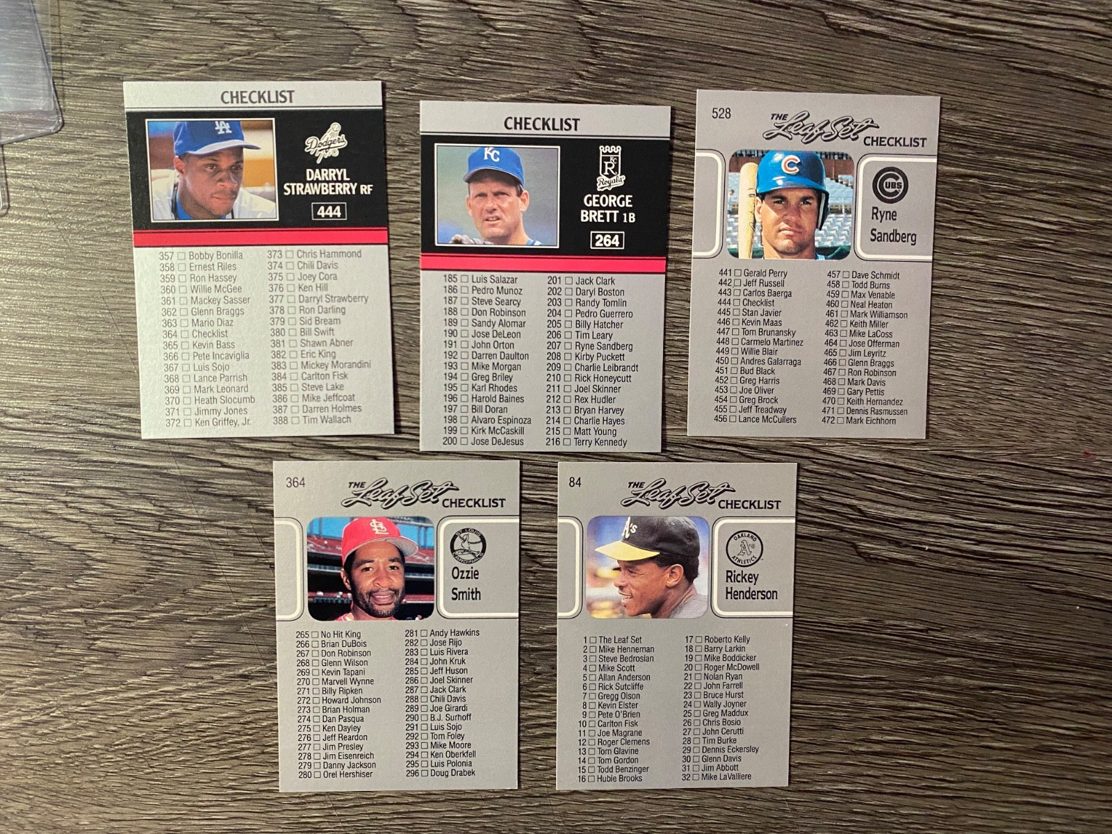 BASEBALL CARDS: LEAF BASEBALL CHECKLISTS = LOT OF 10 (RIPKEN, BRETT, HENDERSON+)