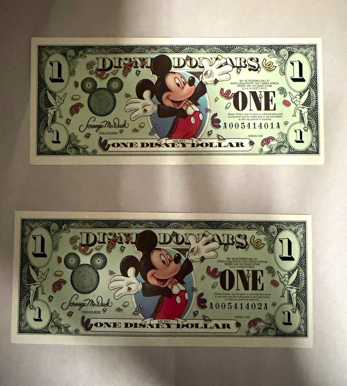 2000 Series Disney Dollars  $1 Uncirculated Consecutive Lot of 2 Series A