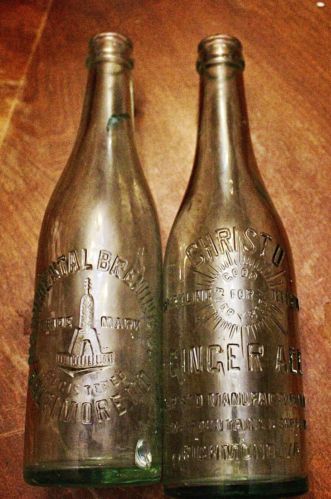 Clear Embossed Bottles Lot of 2 - Christo Ginger Ale & Monumental Brewing co.