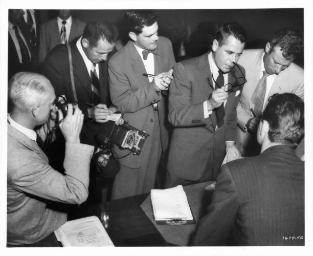Glenn Ford is surrounded by reporters in Trial 1955 Historic Old Photo