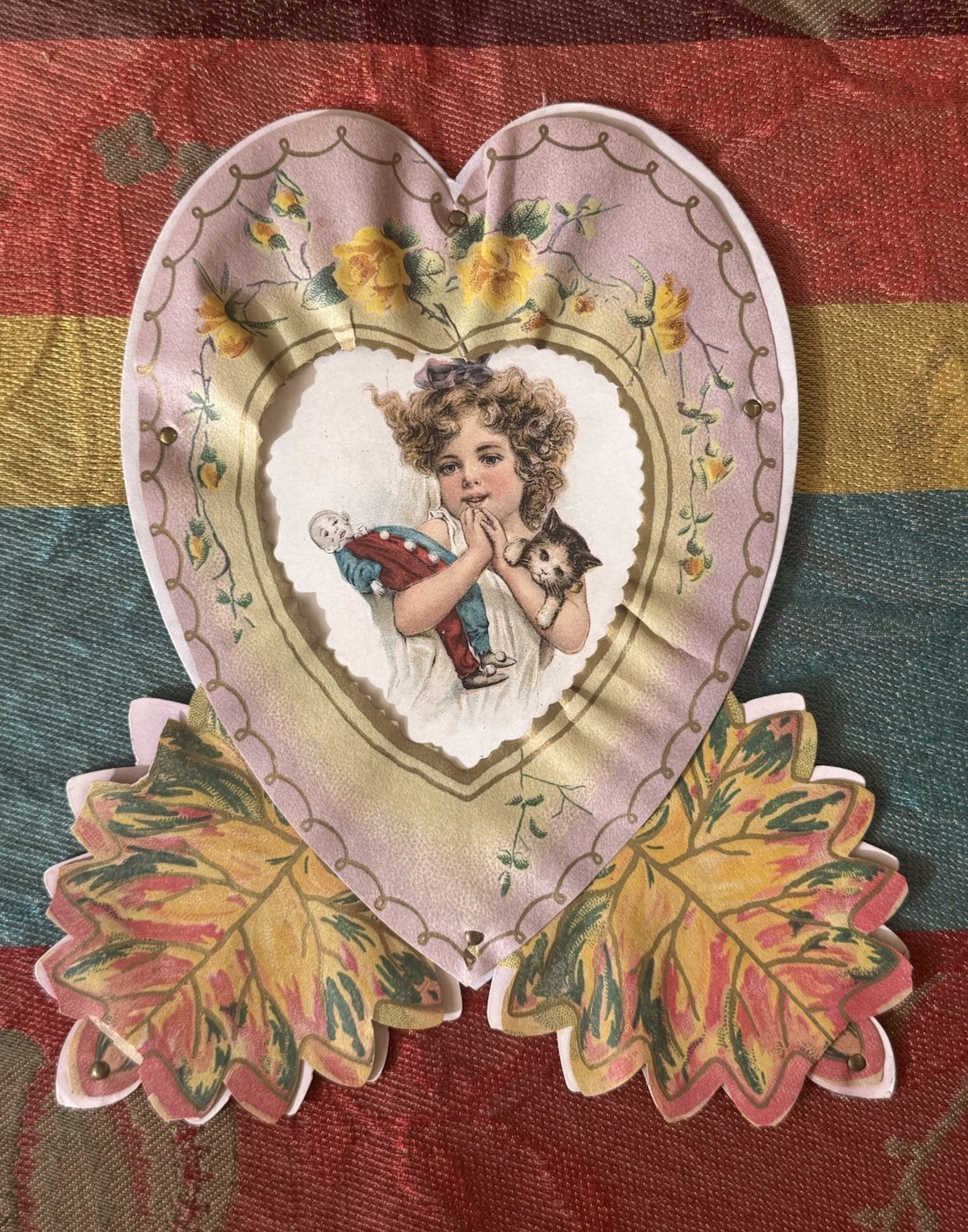 Antique 1920s paper litho Valentine heart girl with clown doll cat floral leaves