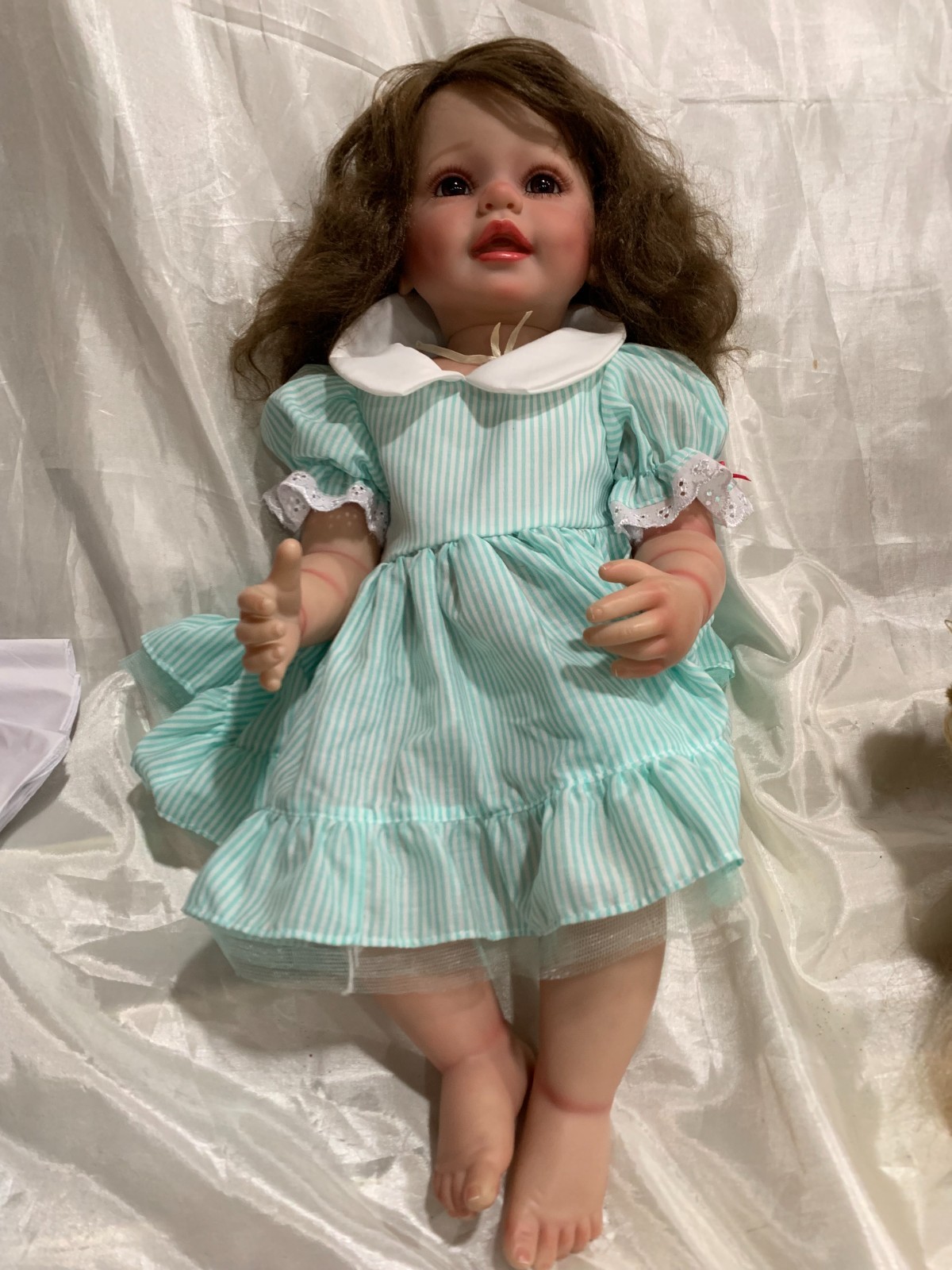 Ying Huan Mei. Adorable Doll With Brown Hair