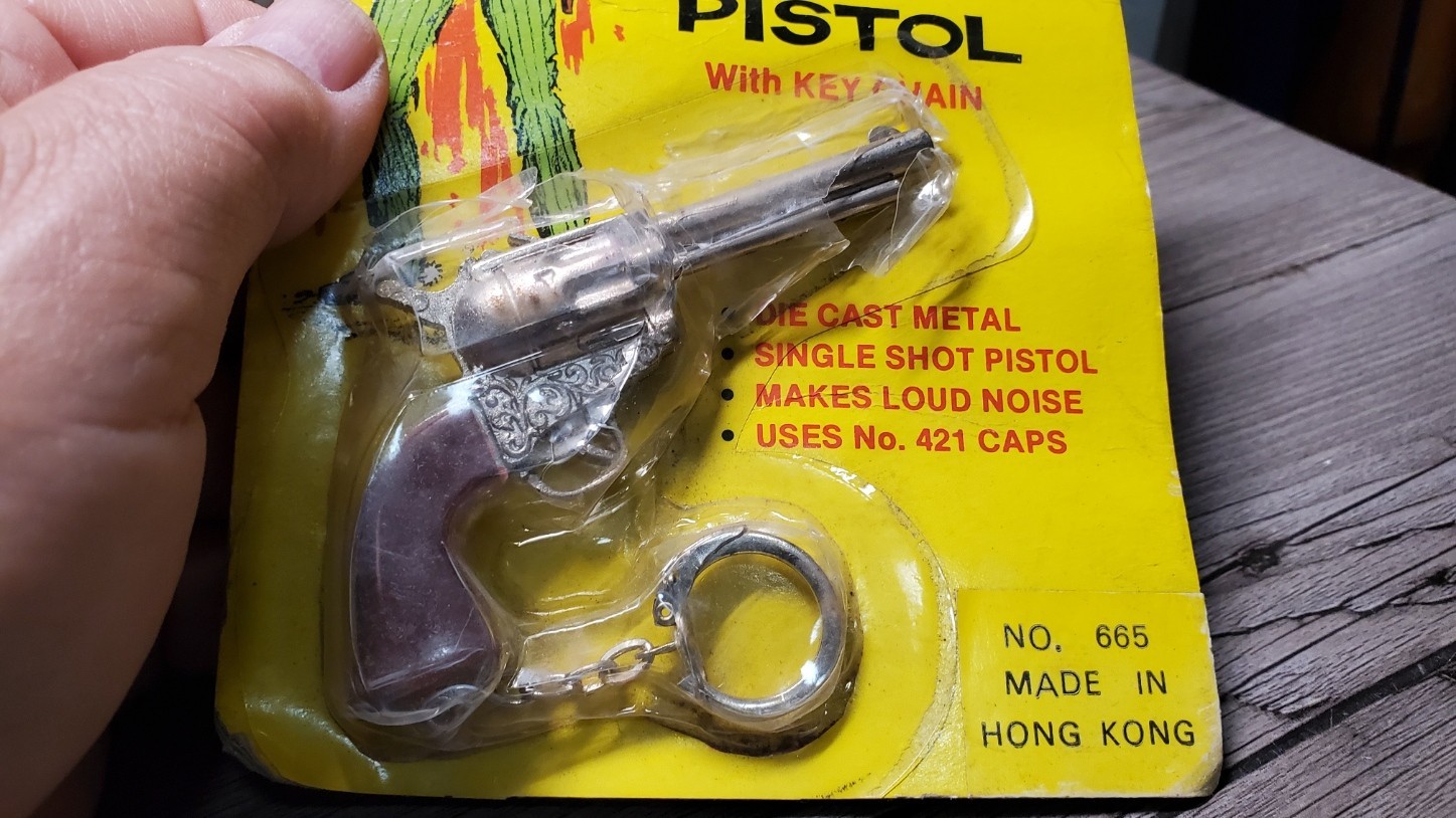 Vintage Miniature Cap Gun Keychain Die Cast Metal Toy Pistol Hong Kong Sealed