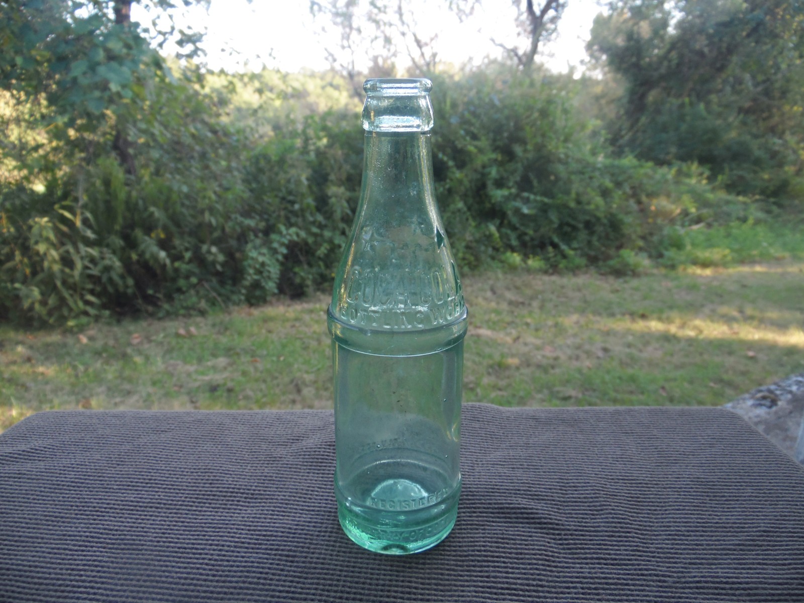 VINTAGE LIGHT GREEN STRAIGHT SIDE COCA COLA BOTTLE LOUISVILLE,KY CIRCA 1920\'s.