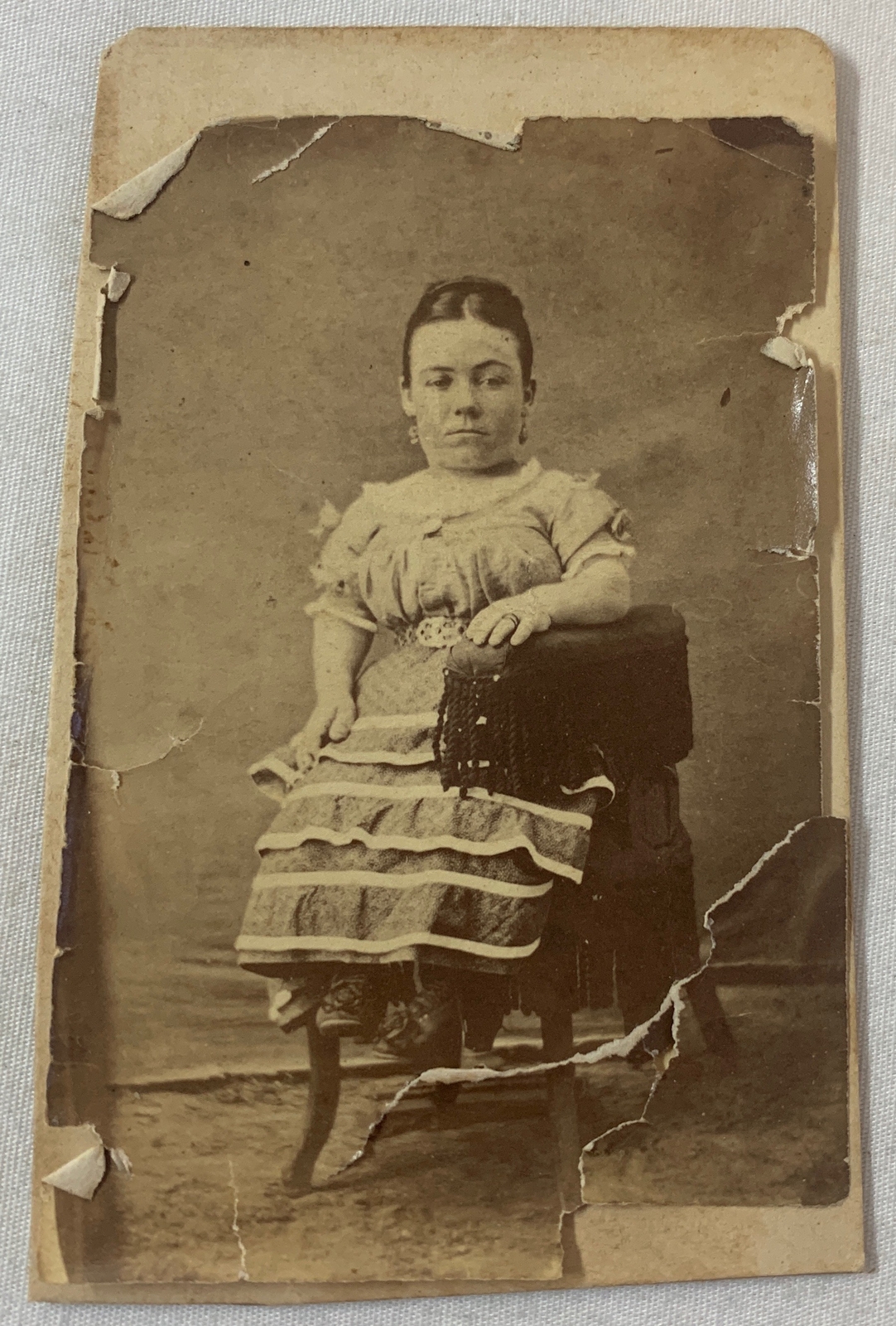 antique photo ~ SEATED FEMALE LITTLE PERSON ~torn and detached from card ~ 2.5x4