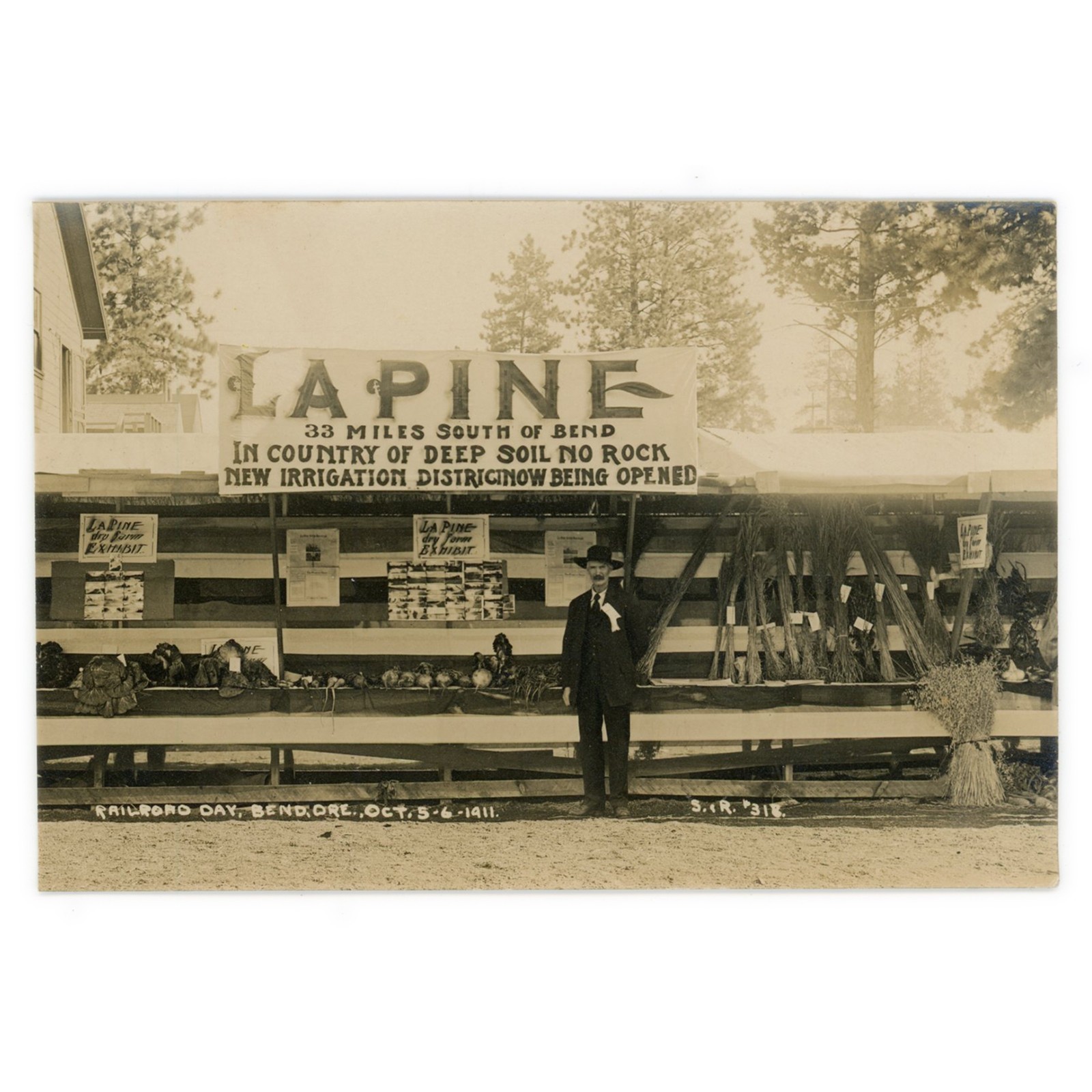 Photo Postcard of Bend Oregon 1911 Railroad Day - RPPC La Pine Farm Exhibit