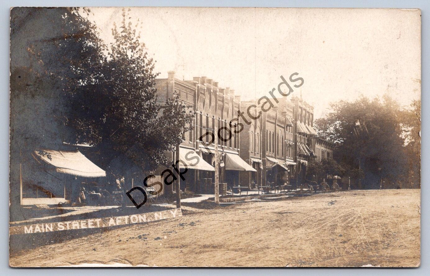 K64/ Afton New York RPPC Postcard c1910 Main Street Stores 268