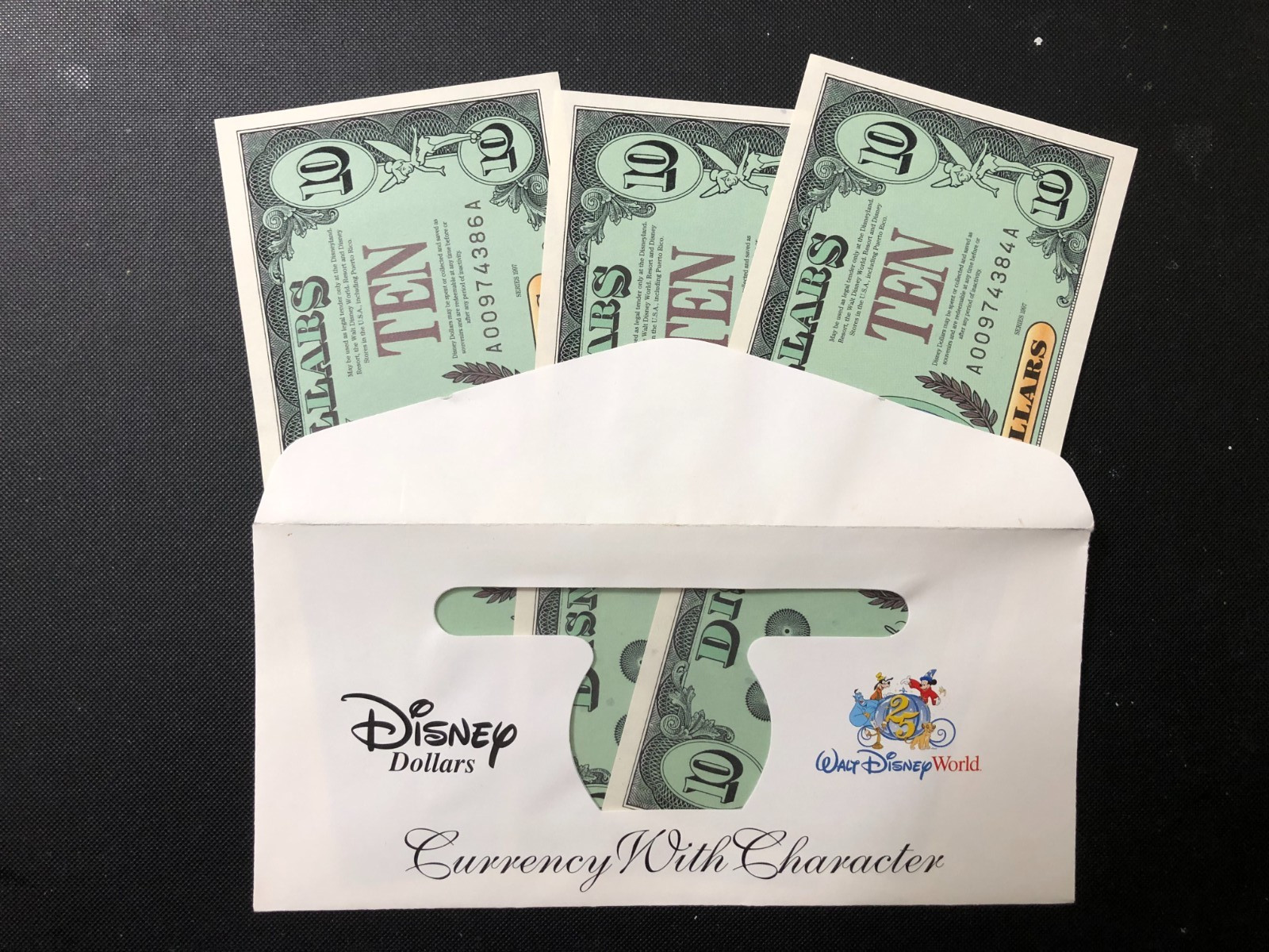 RARE Disney Dollars 25th Aniv. $10 w/ Envelope Consecutive Numbers Very Rare