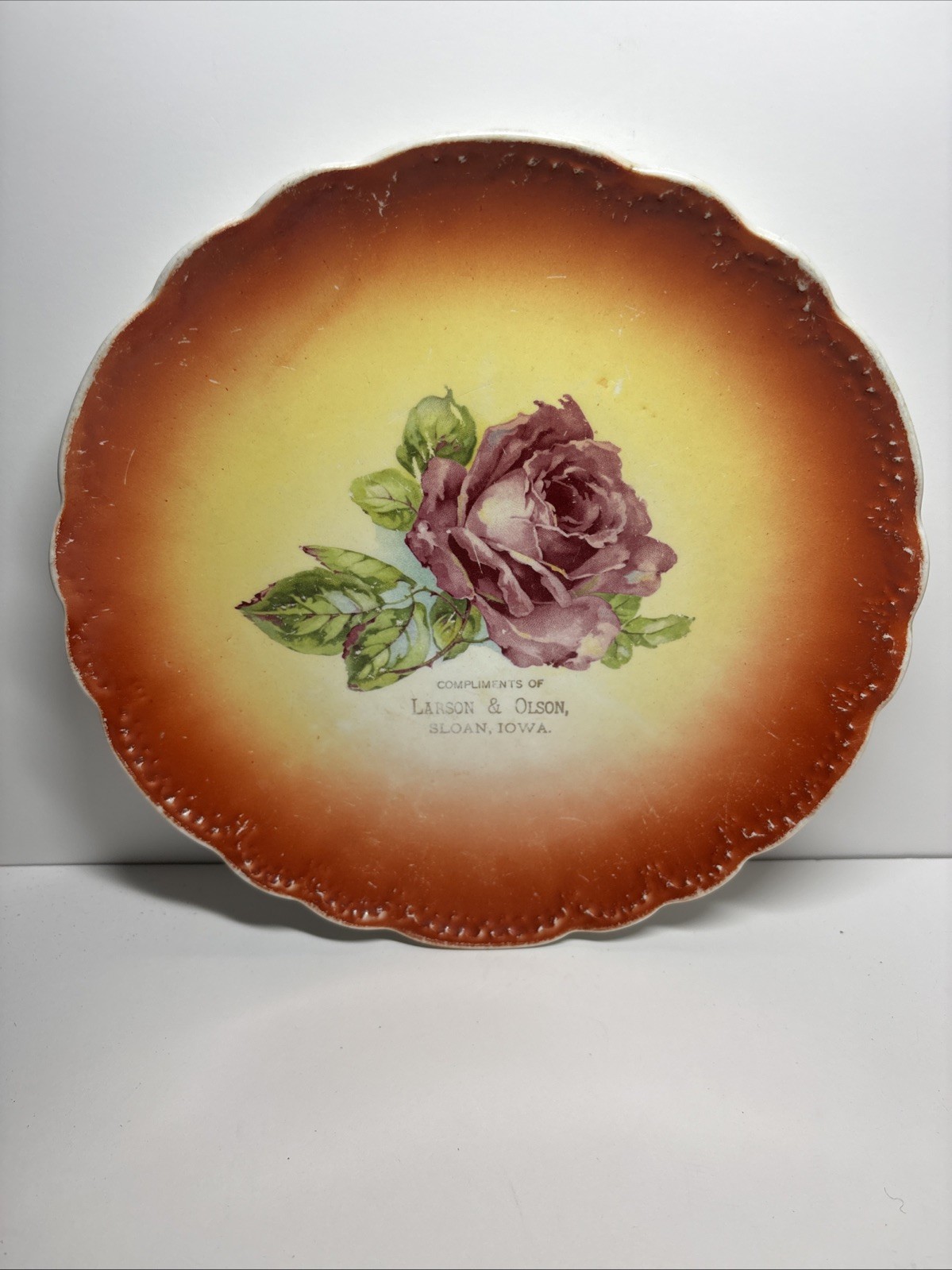 Vintage Sloan Iowa Advertising Plate Compliments Of Larson & Olson