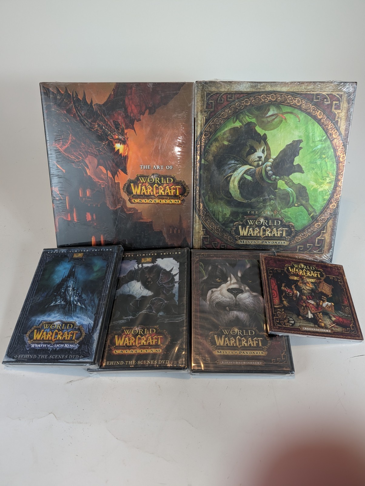 World of Warcraft Art Book & Collector DVD Lot – Cataclysm, Pandaria, Lich King
