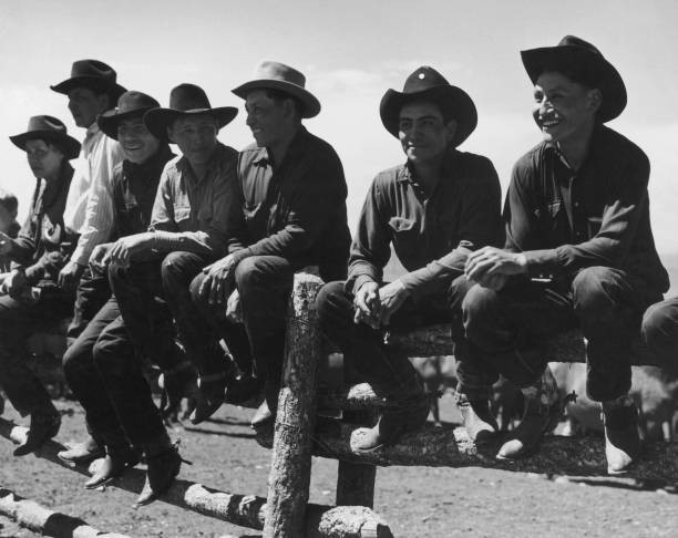 Cowboys at a corral preparing for a round up circa 1940 Historic Old Photo