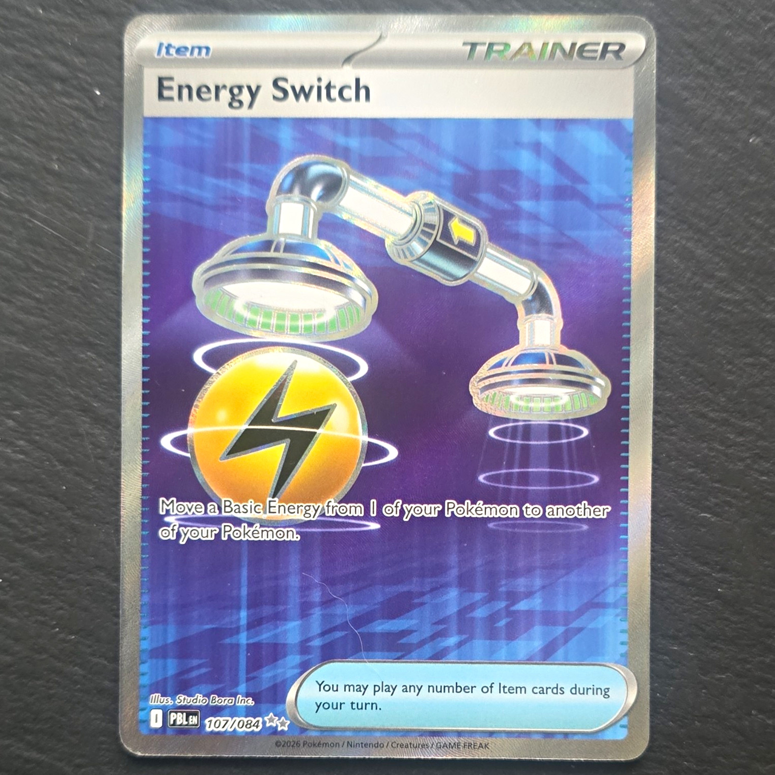 The Pokémon Company Energy Switch 107/084 Pitch Black IR U EN 2026