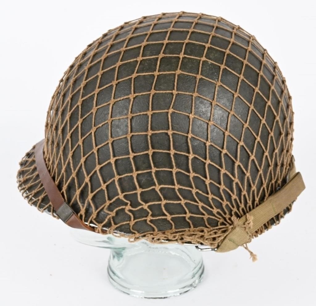 Original WWII US Army M1 Combat Helmet front seam, swivel bale, netting leather