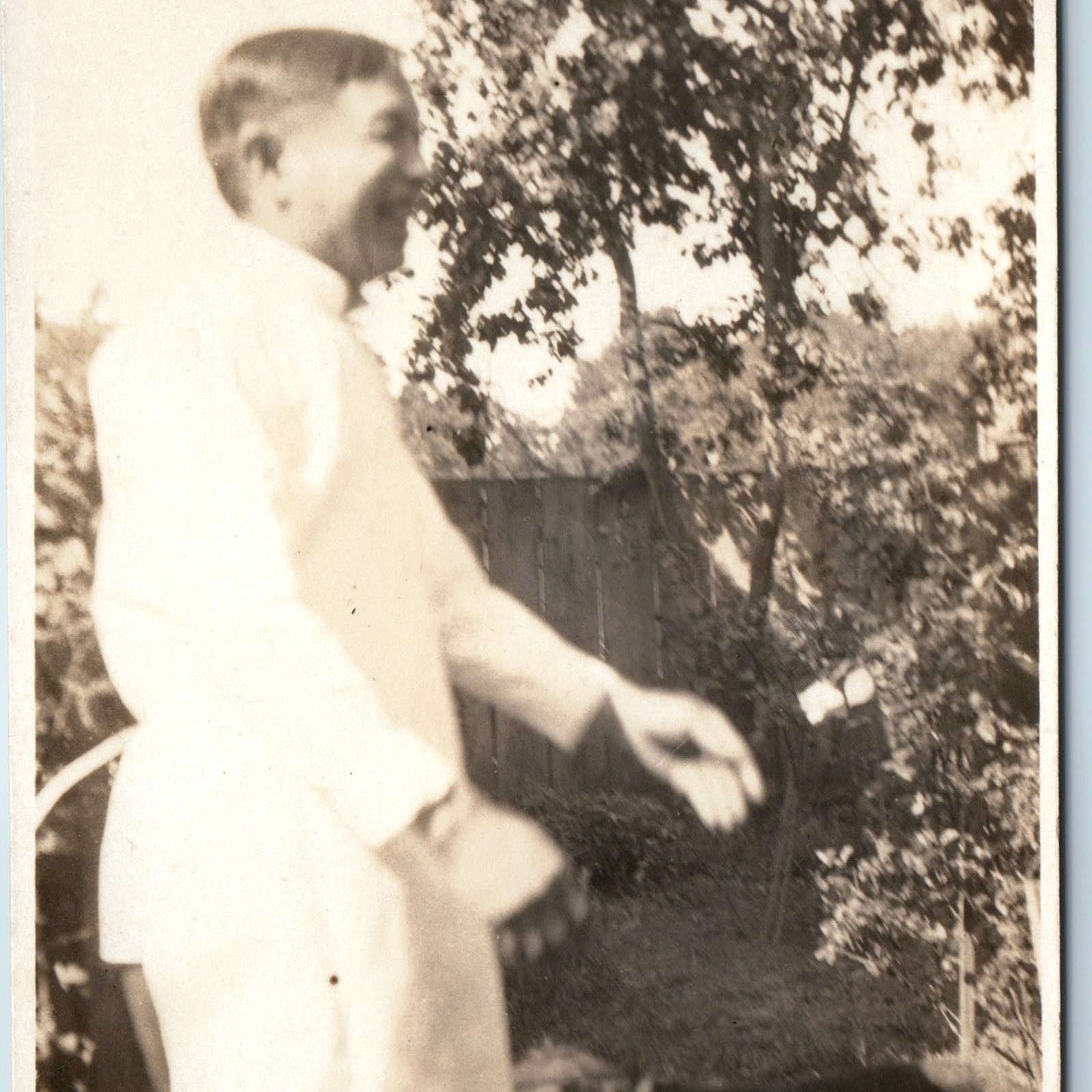 c1910s Man White Uniform Doctor Cook RPPC Postcard Laughing Outdoors Dog Yard