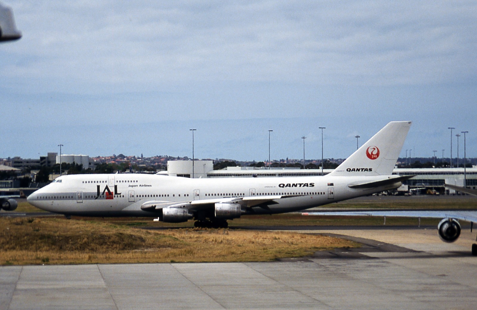 Original Aircraft Slide, Qantas/JAL B.747-338 VH-EBT, Sydney 1992  (A063)