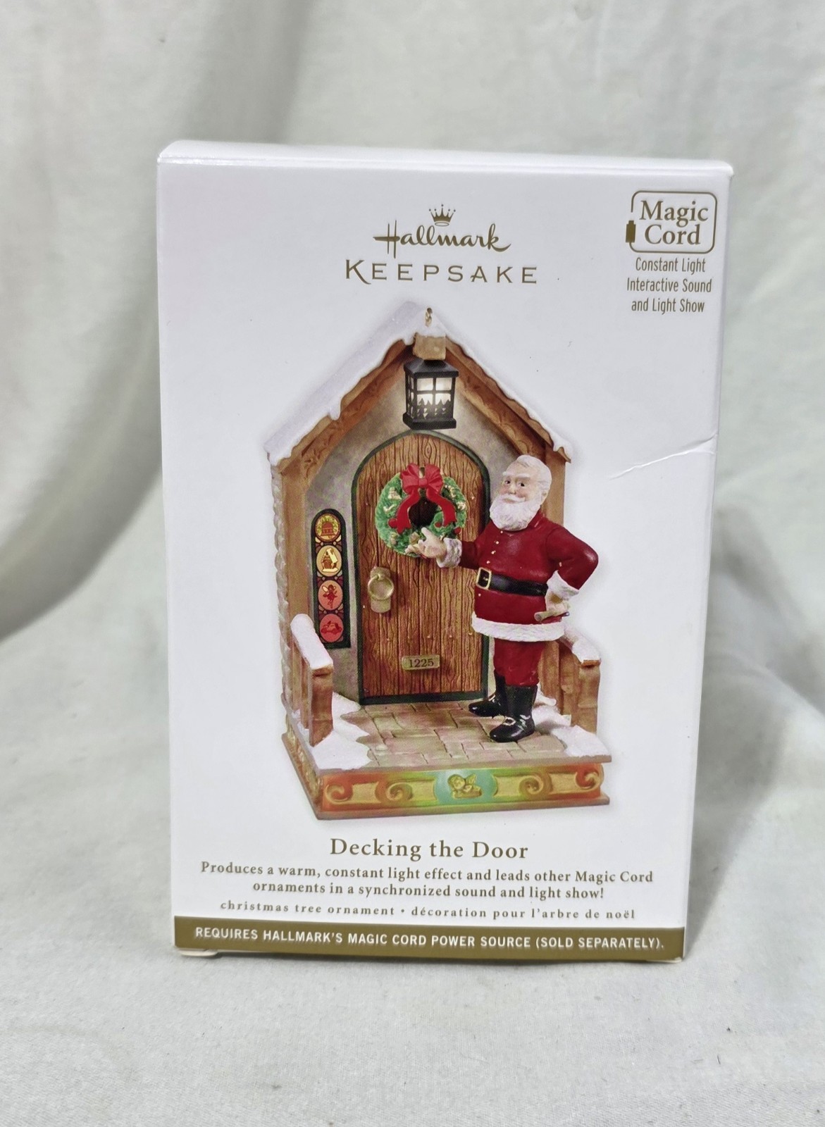 Hallmark Keepsake 2011 Decking the Door Magic Cord Christmas Ornament 