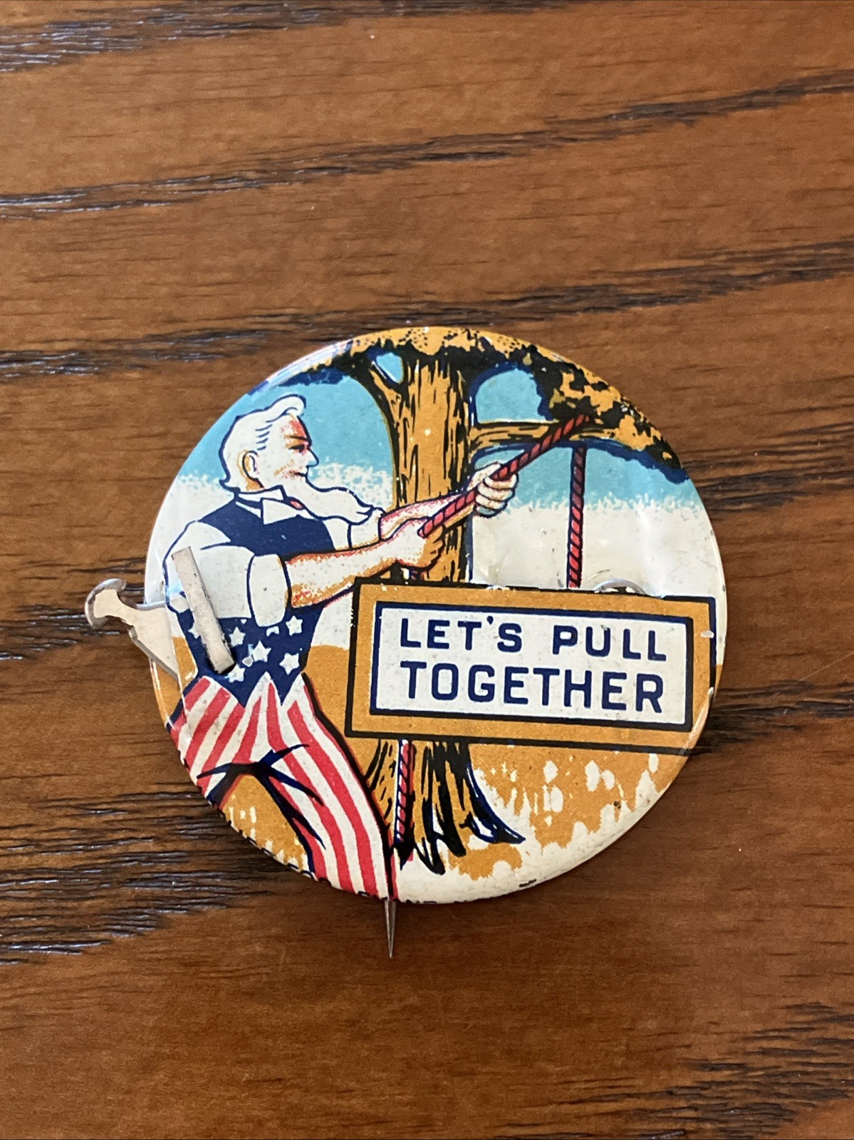 UNCLE SAM Let\'s Pull Together WWII Mechanical Pinback Button Hanging Hitler 1½\