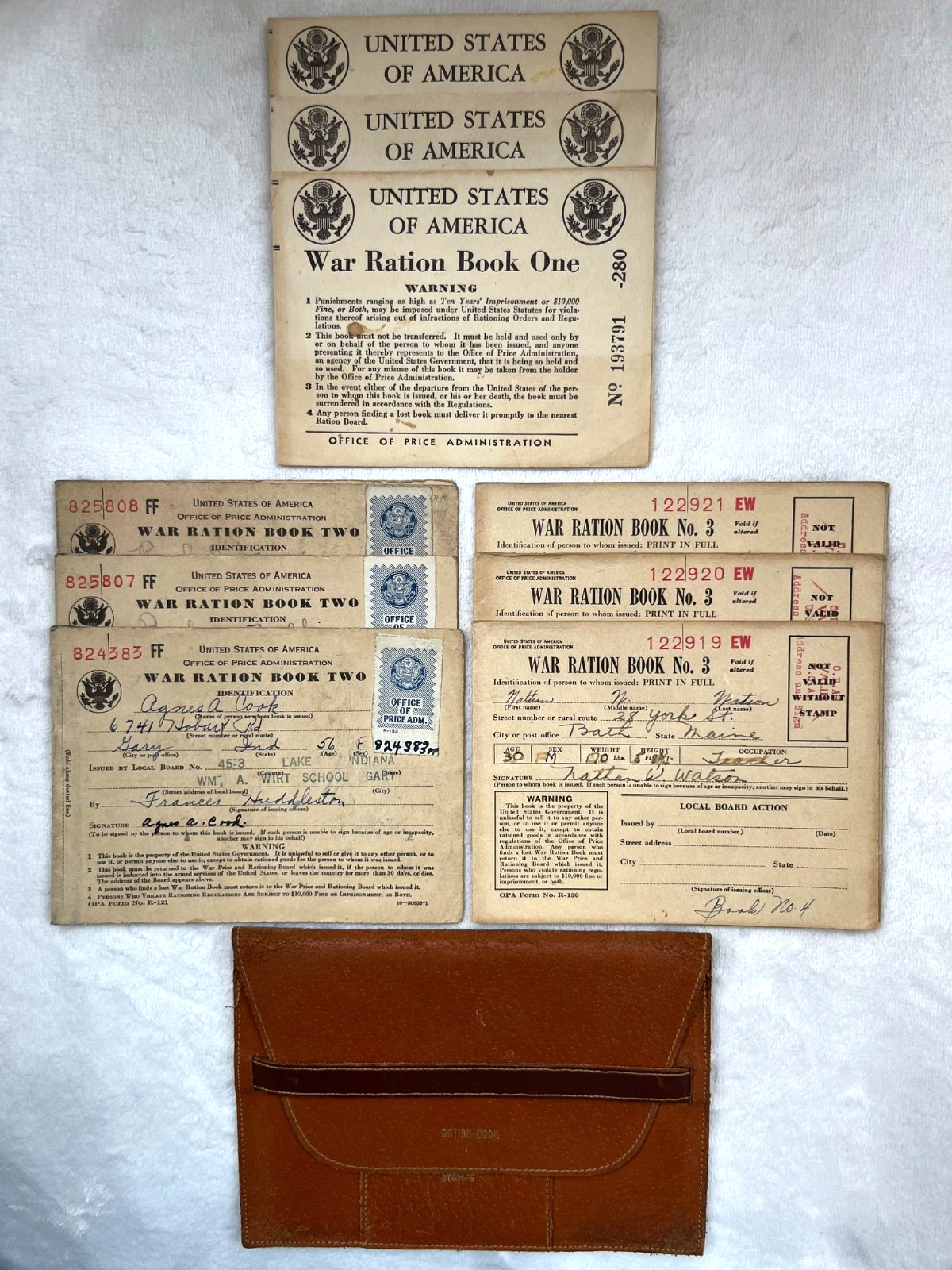 VINTAGE 1940'S LEATHER RATION BOOK HOLDER BY SWANK ALONG WITH 9 WAR RATION BOOKS