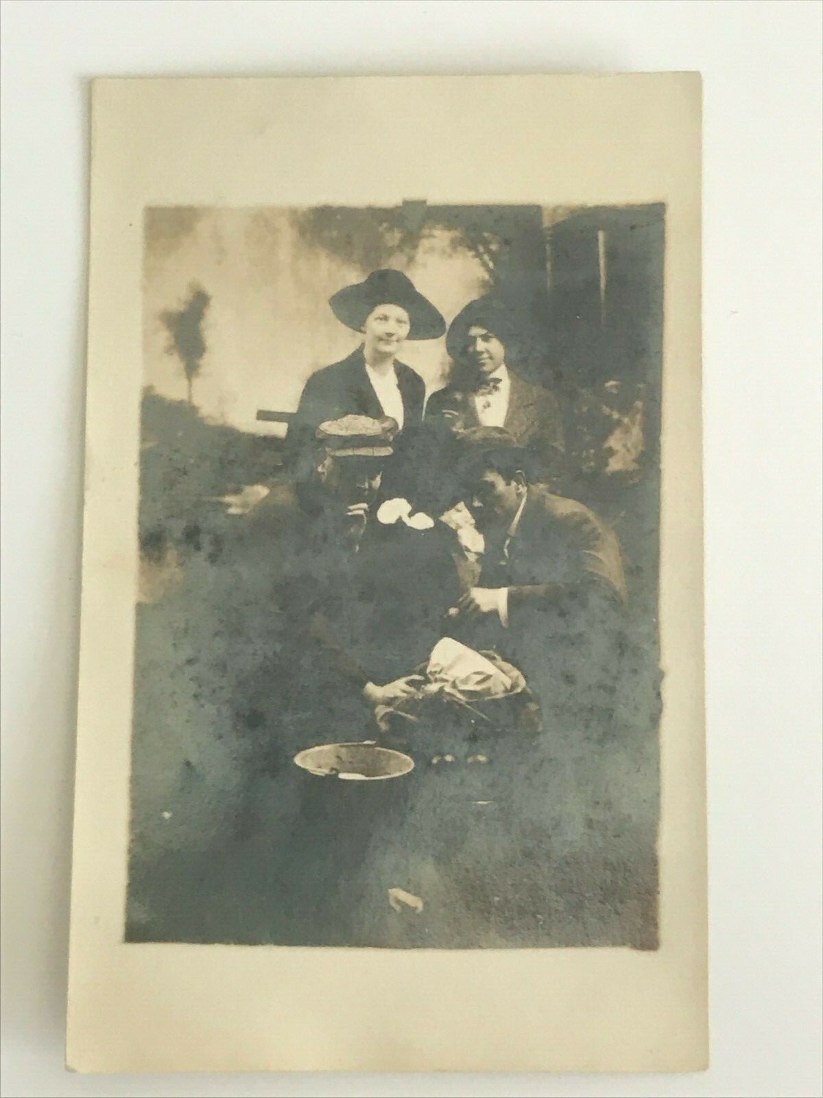 Postcard RPPC Real Photo Two Couples Posing With A Sack c1910's