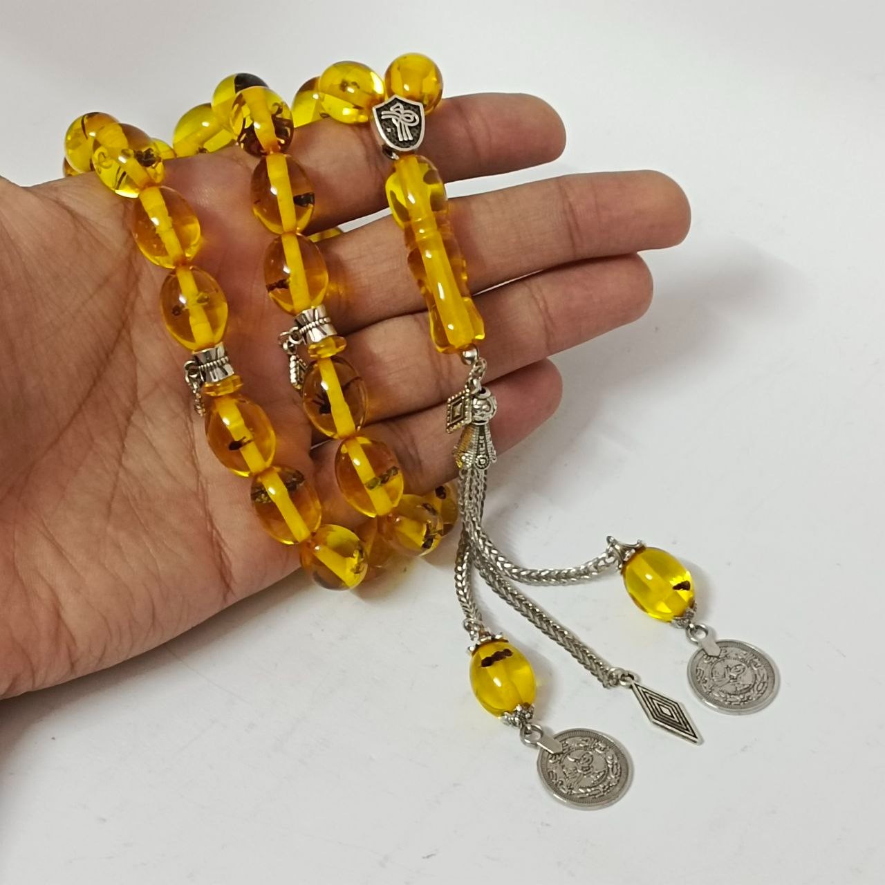 Rare amber-style misbaha Islamic prayer beads with insect inclusions collectible