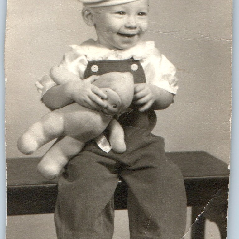 c1940s Cute Smiling Baby Boy Sailor Hat Overalls Holding Toy Doll Vintage Photo