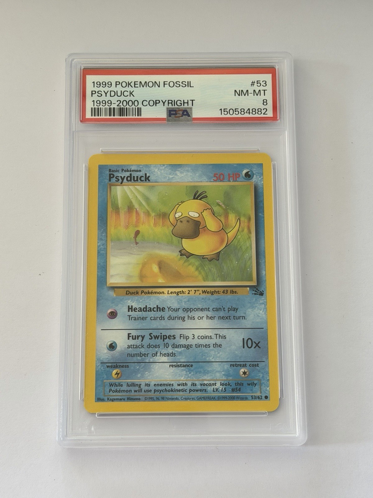 1999-2000 Copyright Psyduck #53, Fossil ‘3rd Print’, PSA 8